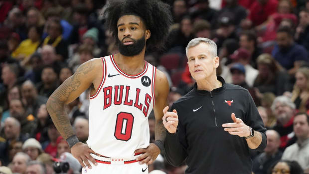 Chicago Bulls guard Coby White (0) talks with head coach Billy Donovan 